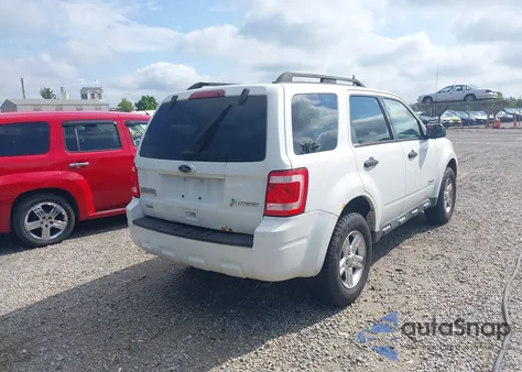 2011 Ford Escape Hybrid z USA, uszkodzony, nr VIN 1FMCU5K33BKC19625